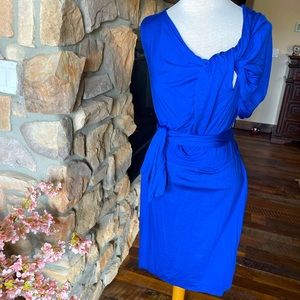 TRINA TURK Los Angeles size 10 jersey wrap dress with asymmetrical sleeves.